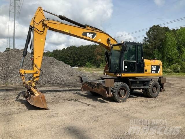 CAT M316D Pelle sur pneus