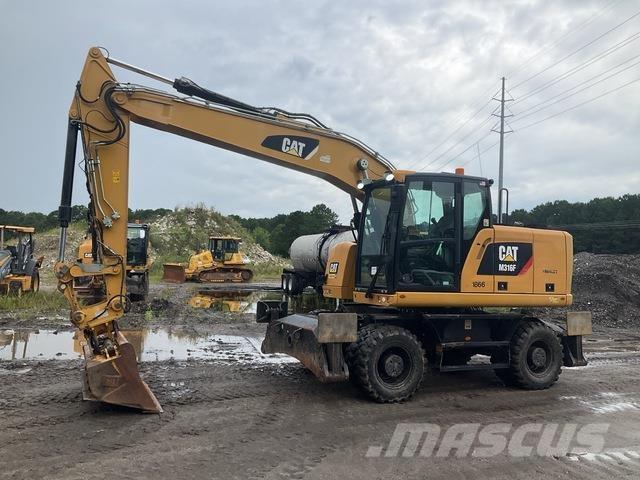 CAT M316F Pelle sur pneus
