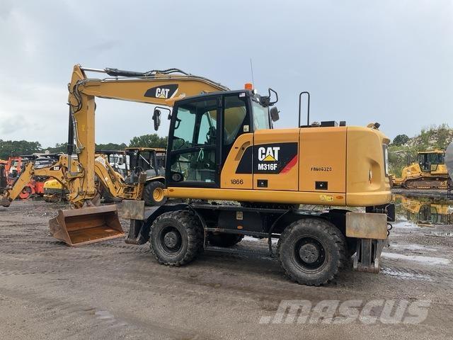 CAT M316F Pelle sur pneus