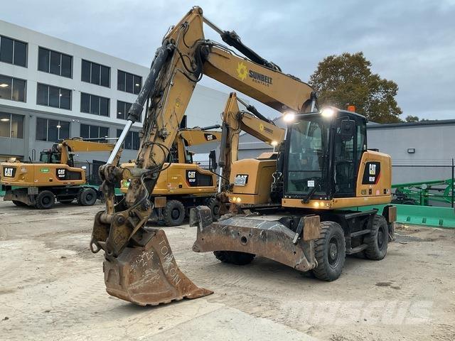 CAT M316F Pelle sur pneus