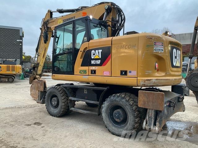 CAT M316F Pelle sur pneus