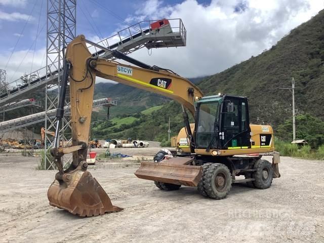 CAT M317D2 Pelle sur pneus