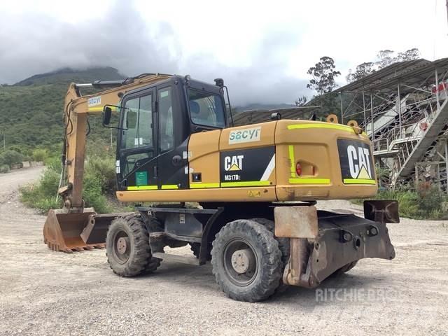 CAT M317D2 Pelle sur pneus