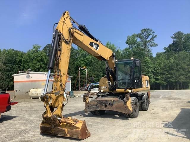 CAT M318D Pelle sur pneus
