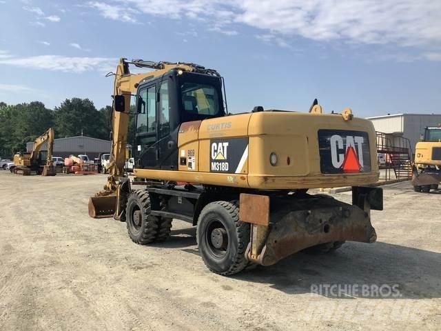 CAT M318D Pelle sur pneus