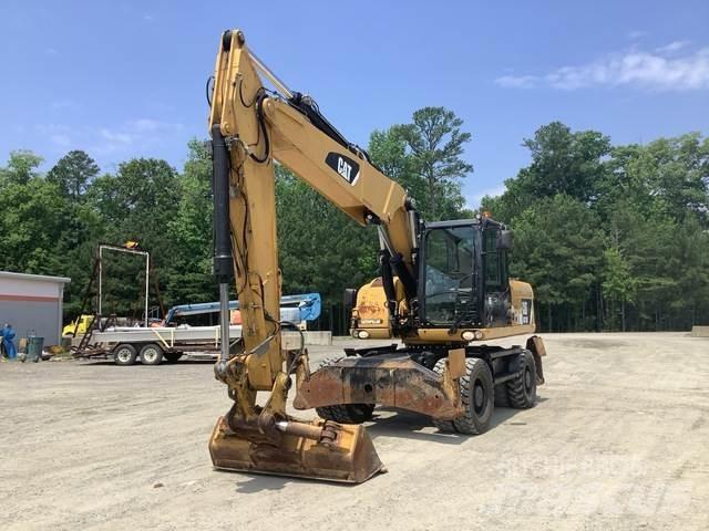 CAT M318D Pelle sur pneus