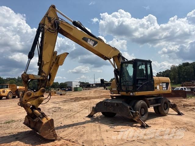 CAT M318D Pelle sur pneus