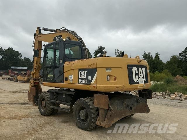 CAT M318D Pelle sur pneus
