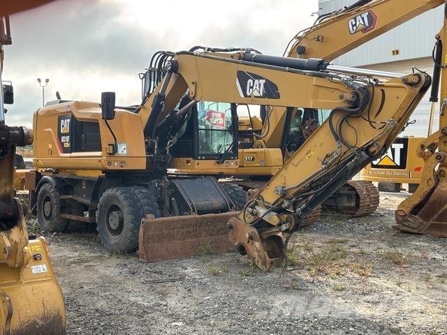 CAT M318F Pelle sur pneus