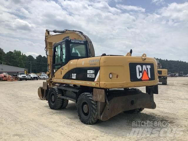 CAT M322D Pelle sur pneus