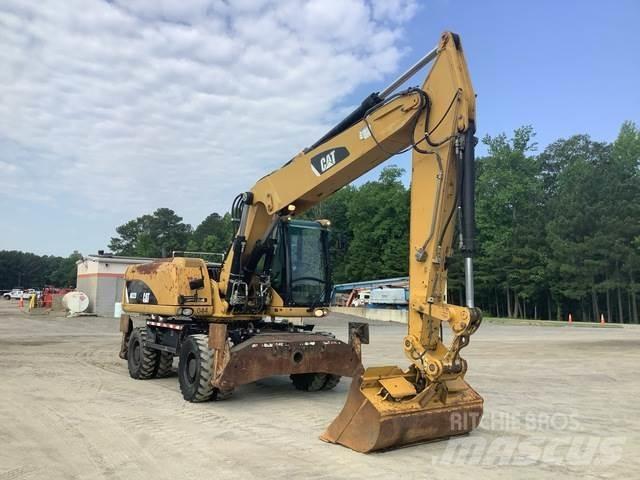 CAT M322D Pelle sur pneus