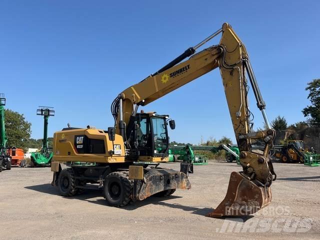 CAT M322F Pelle sur pneus