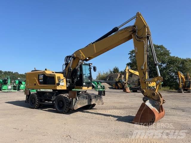 CAT M322F Pelle sur pneus