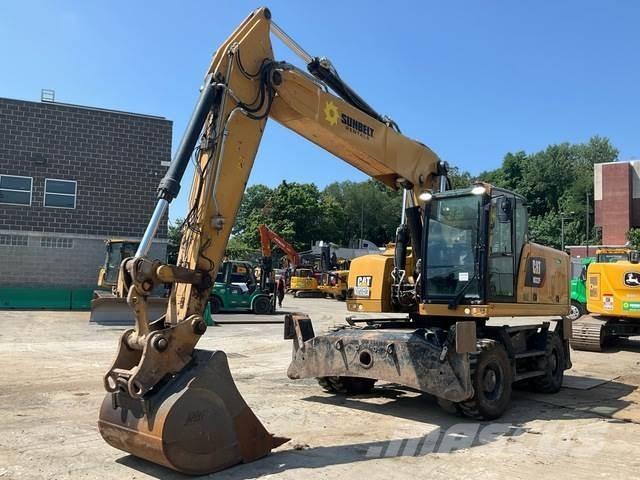 CAT M322F Pelle sur pneus
