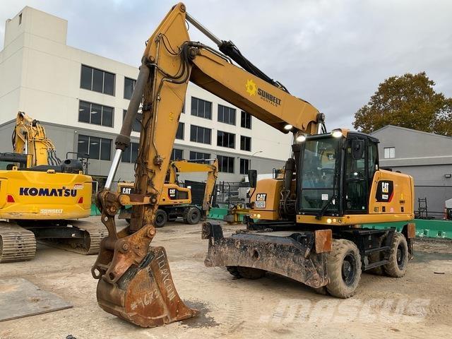 CAT M322F Pelle sur pneus