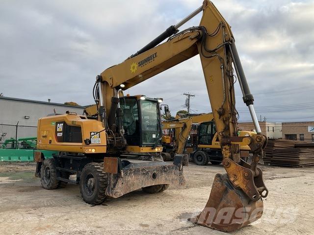 CAT M322F Pelle sur pneus