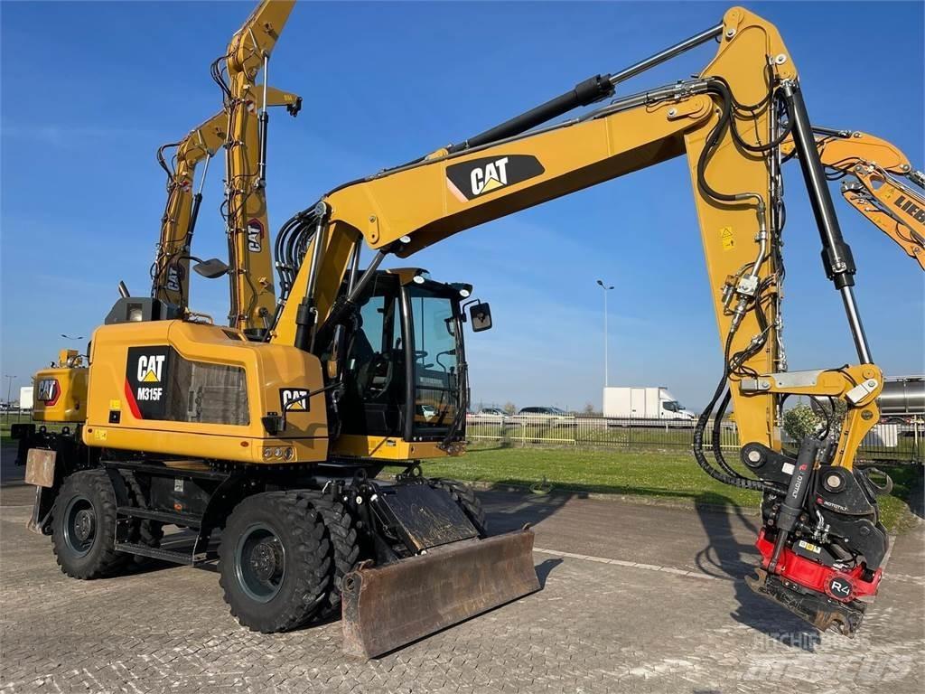 CAT M315F Pelle sur pneus