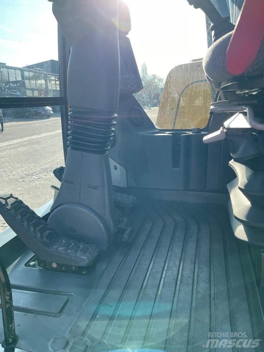 CAT M315F Pelle sur pneus