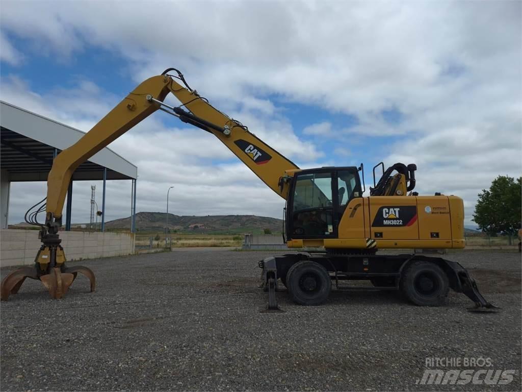 CAT MH3022 Pelle sur pneus
