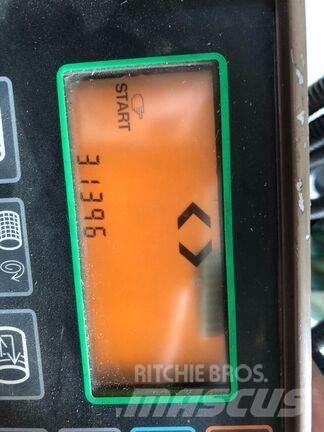 John Deere 590 Presse à balle ronde