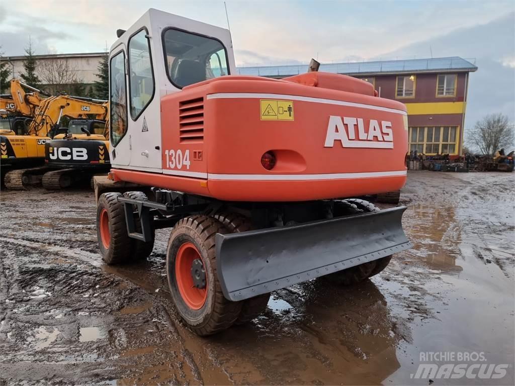 Atlas 1304 Pelle sur pneus