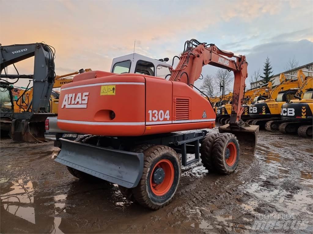 Atlas 1304 Pelle sur pneus
