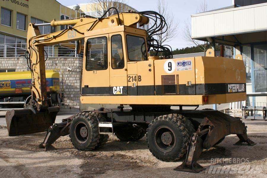CAT 214B Pelle sur pneus