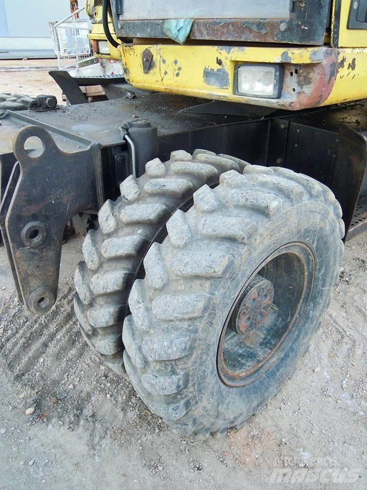 CAT M312 Pelle sur pneus