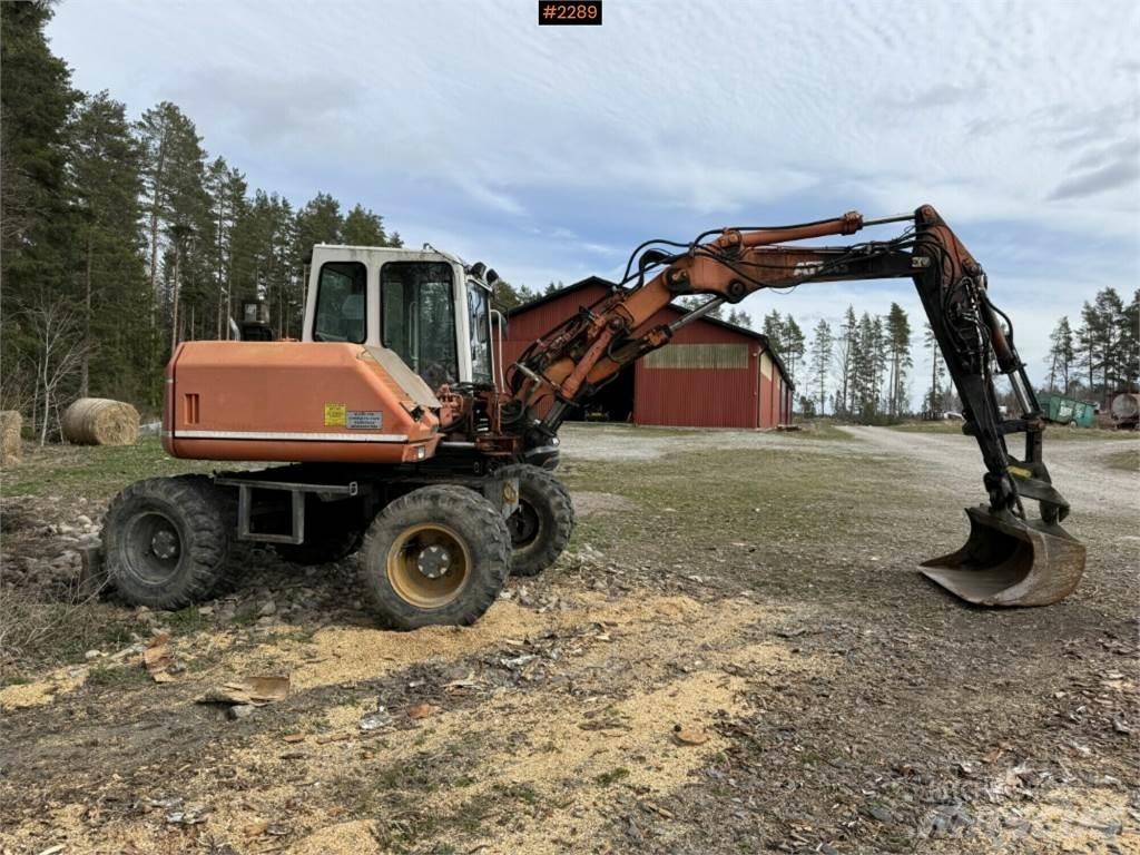 Atlas 1004 Pelle sur pneus