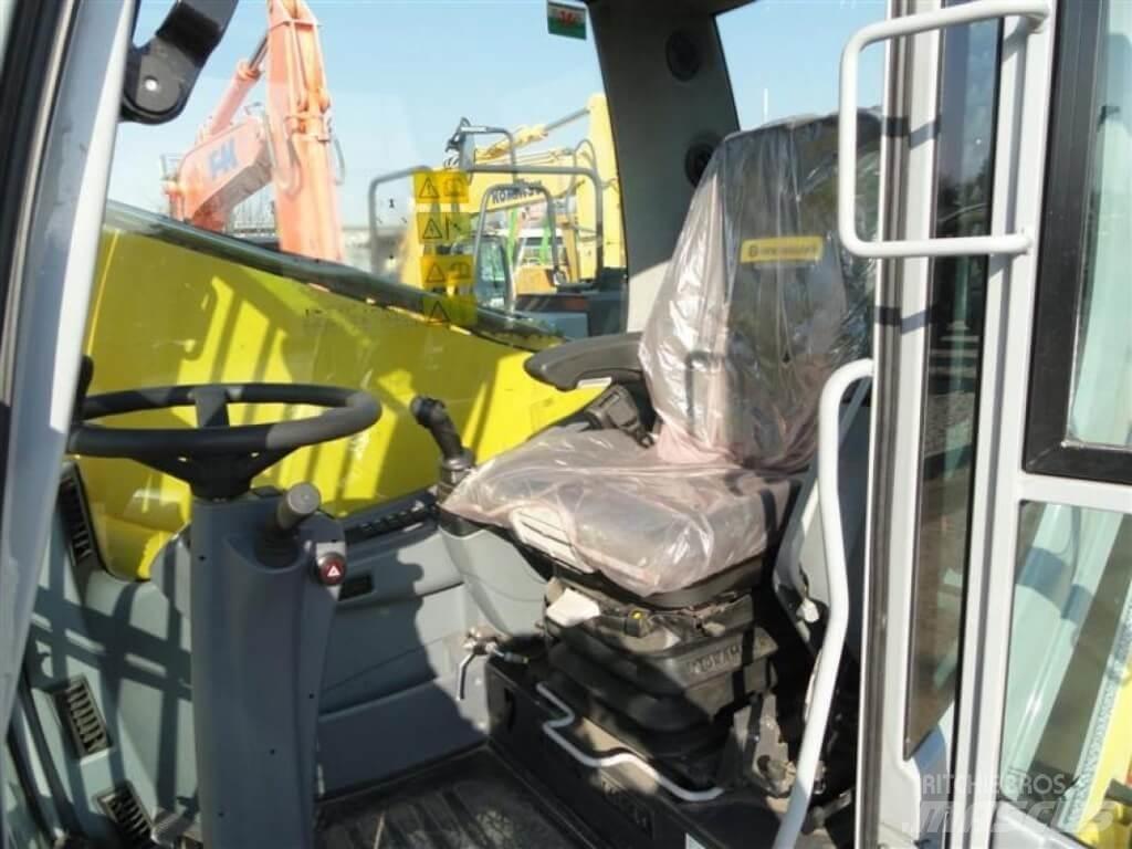 New Holland WE210 Pelle sur pneus