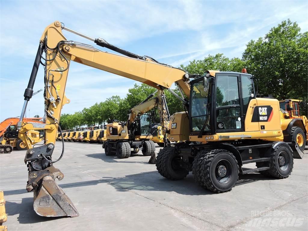 CAT M315 Pelle sur pneus