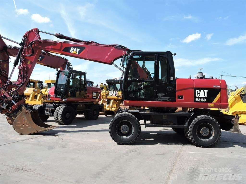 CAT M316D Pelle sur pneus