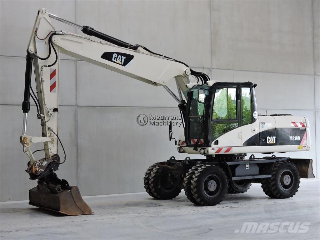 CAT M318D Pelle sur pneus