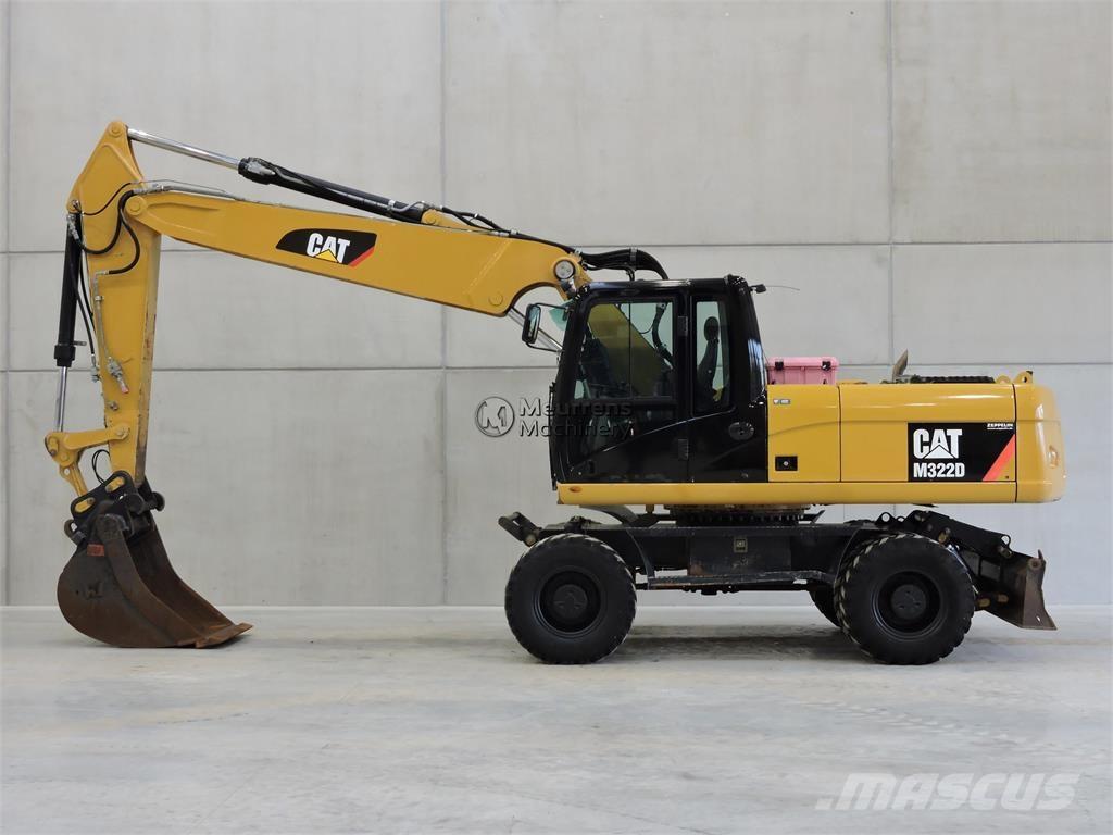 CAT M322D Pelle sur pneus