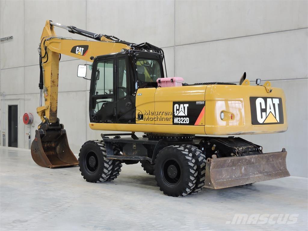 CAT M322D Pelle sur pneus