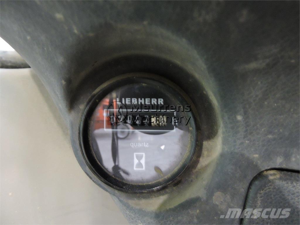 Liebherr A312 Pelle sur pneus