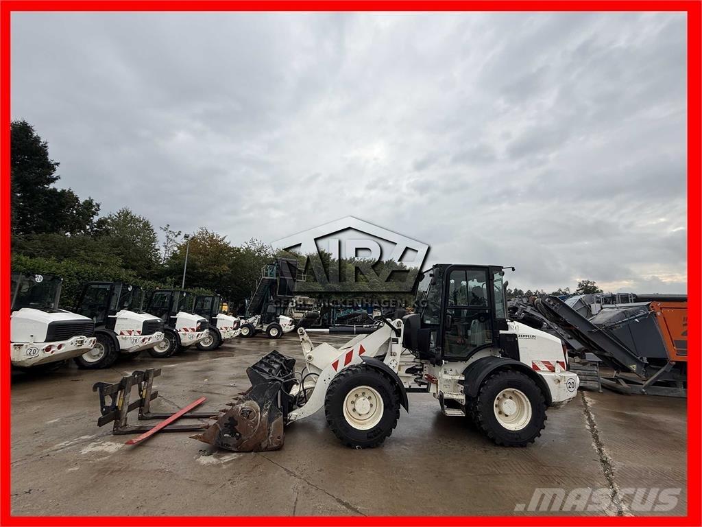 CAT 908M Chargeuse sur pneus