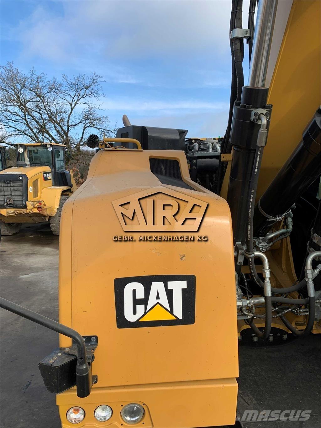 CAT M 315 F Pelle sur pneus