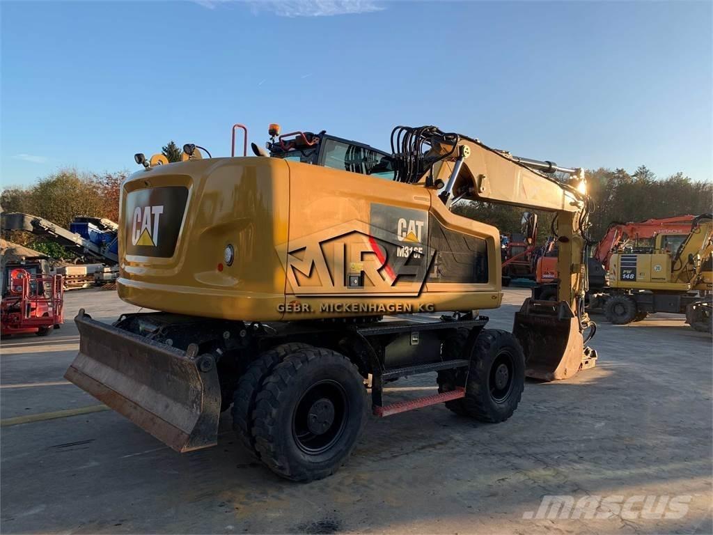 CAT M 316 F Pelle sur pneus