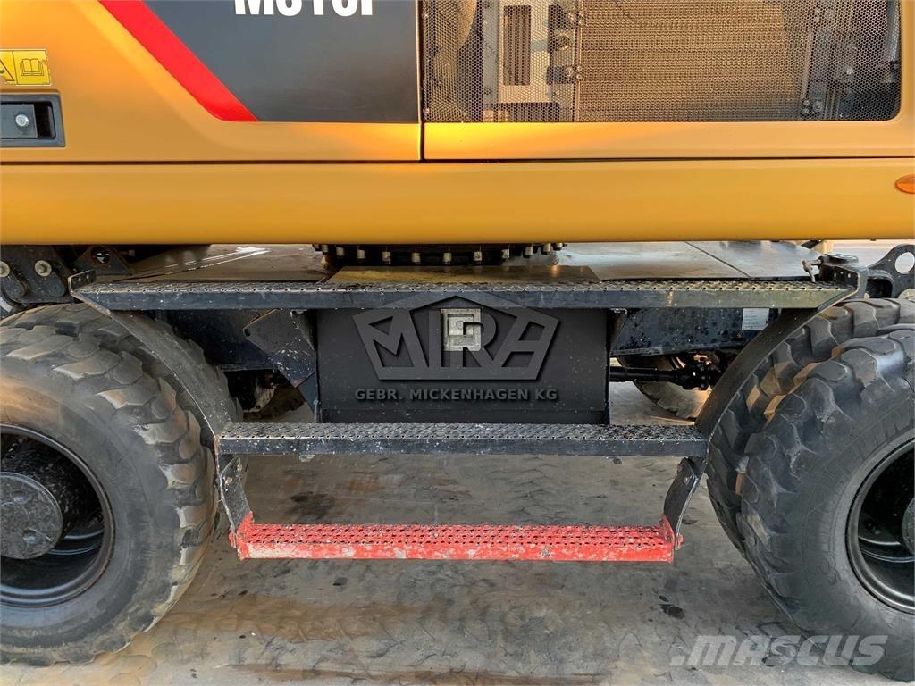 CAT M 316 F Pelle sur pneus