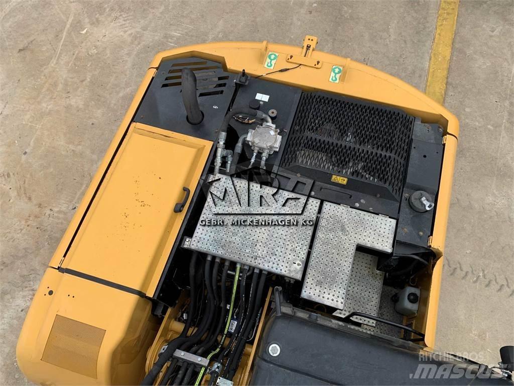 CAT M 316D Pelle sur pneus