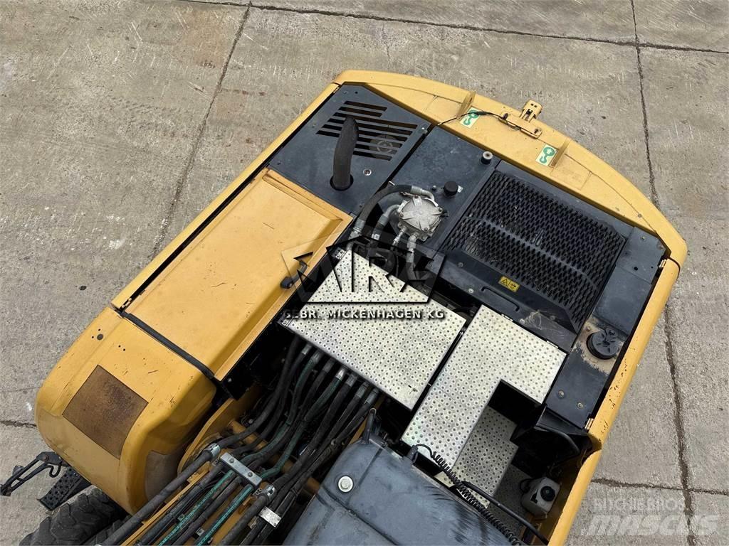CAT M 318 D Pelle sur pneus