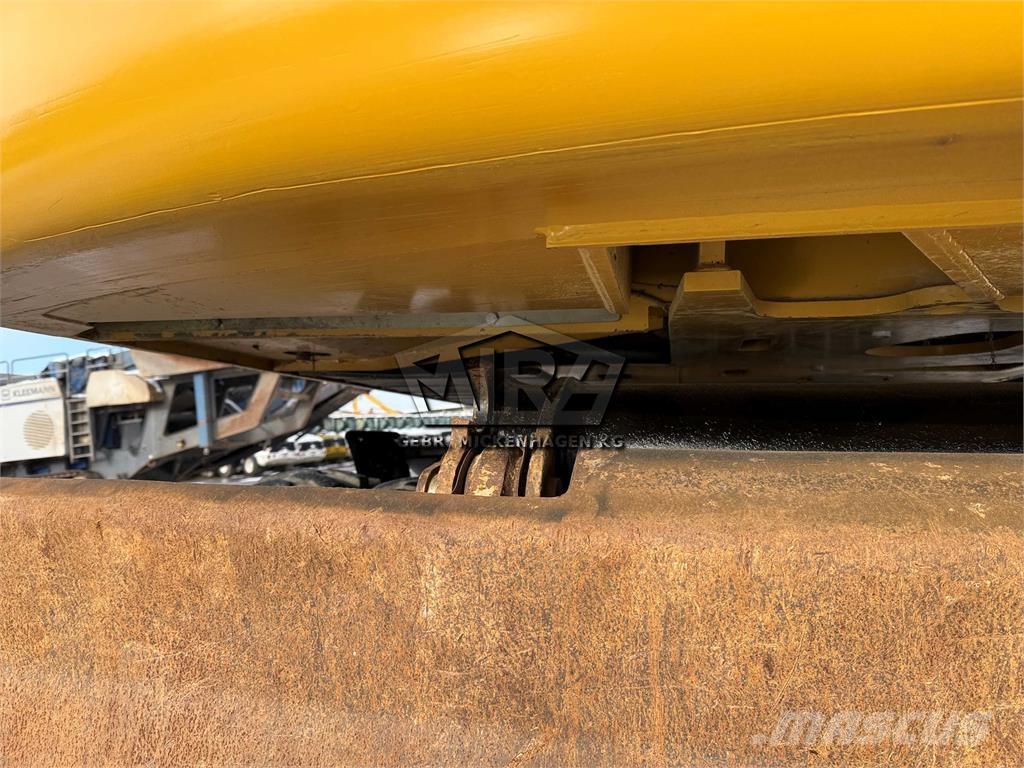 CAT M 318 D Pelle sur pneus