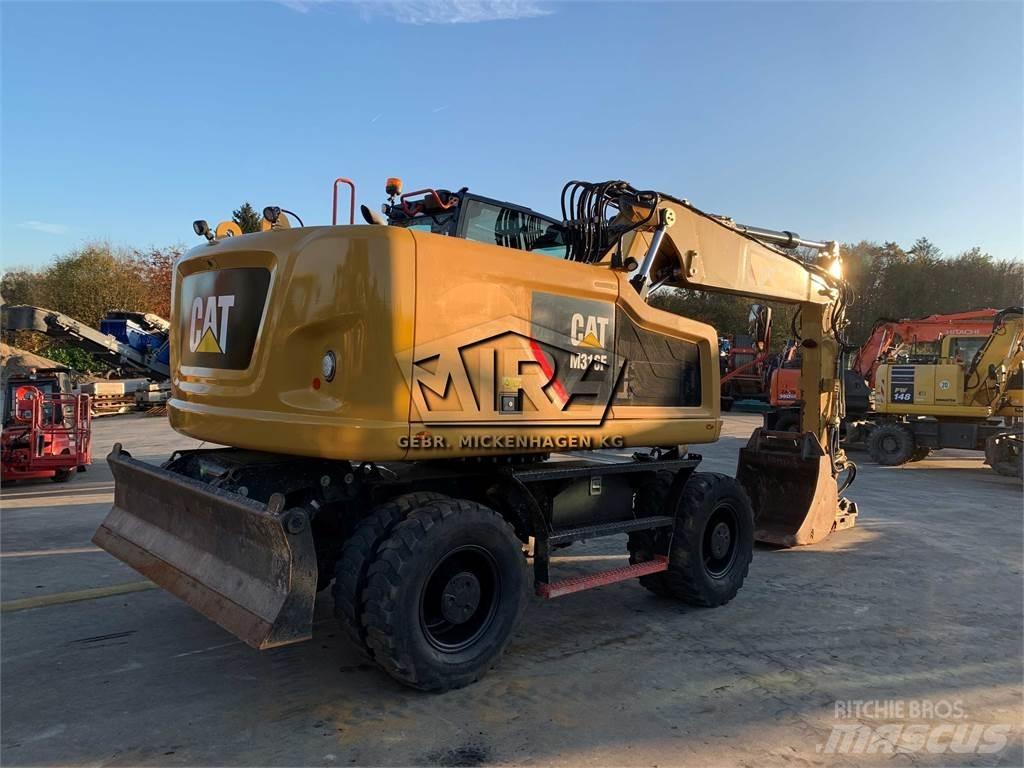 CAT M316 F Pelle sur pneus