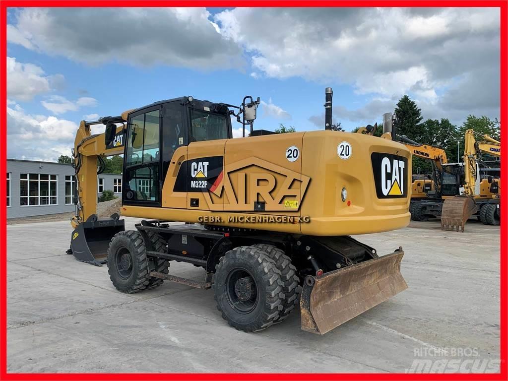 CAT M322 F Pelle sur pneus
