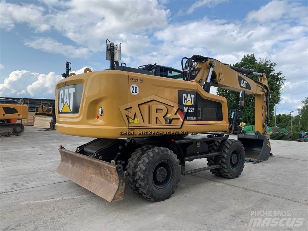 CAT M322 F Pelle sur pneus
