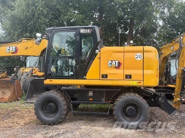 CAT M 314 NEU Pelle sur pneus