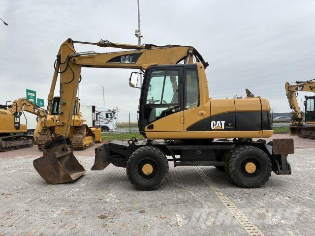 CAT M313C Construction - Autres