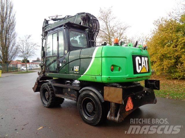 CAT M315 D Pelle sur pneus