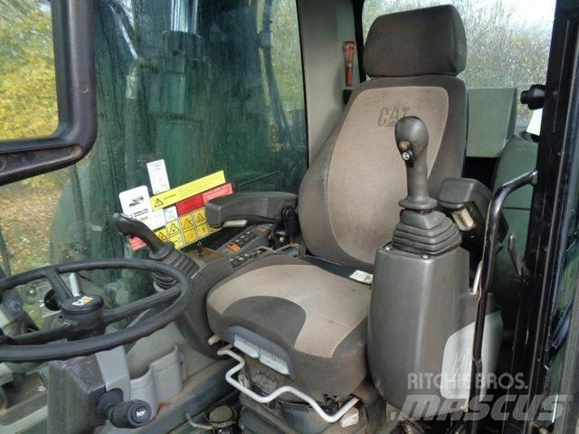 CAT M315 D Pelle sur pneus